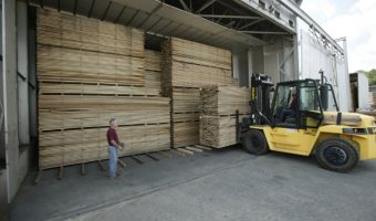 forklift loading kiln with lumber